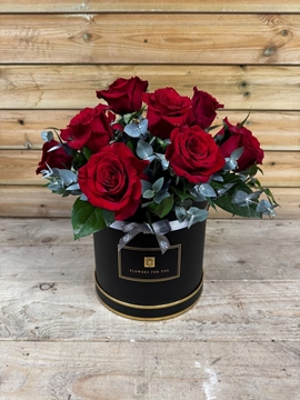 A luxury box with red roses
