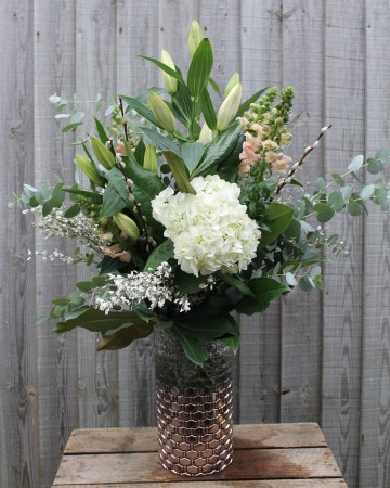 Vase Display Of Ivory Hydrangea, lily, Antirrhinum With Foliage 