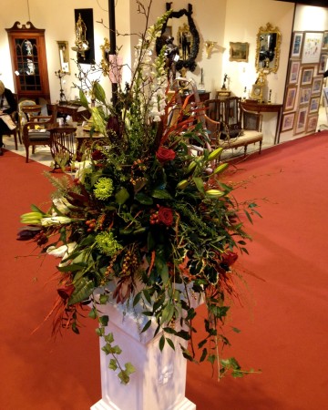 Pedestal Display In Reds And Green At Antiques Fair National Exhibition Centre NEC