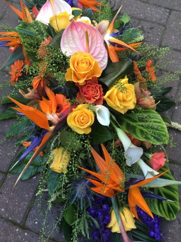 Exotic Mix Casket Spray - Strelitzea - Anthurium - delphinium - Gerbera 