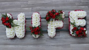 Ribbon Edge - White Based Letters - Red Sprays 