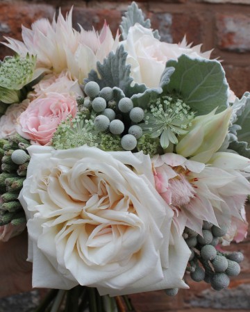 Bridesmaids Bouquet Featuring - Faith Rose - White O'Hara Rose - Bridal Protea - Brunia - Astrantia - Satchia Leaf 