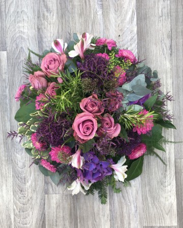 purple and pink posy display - funeral tribute posy design - pink rose purple allium - alstromeria - xanths 