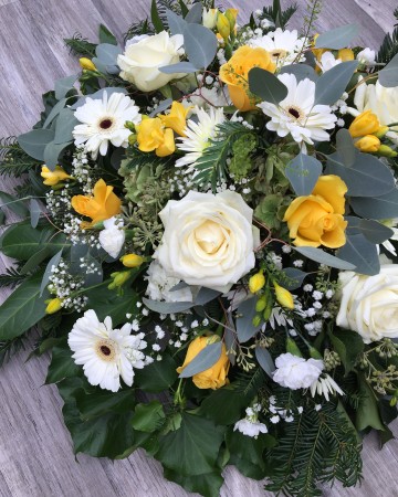 yellow and white posy display - funeral tribute posy deign - ivory rose -germini gypsophilia - yellow freesia rose - spray carnation 