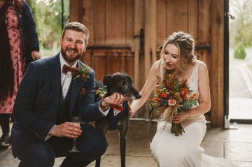 Autumnal wedding at shustoke farm barns - Orange gold navy and nude wedding flowers - quicksand roses - orange roses - blue vibernum - crocosmia - gold fern - floral arch - table plan flowers - wedding cake flowers 