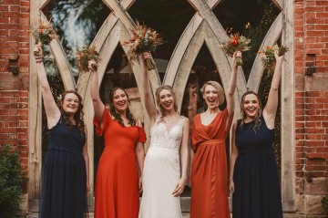 Autumnal wedding at shustoke farm barns - Orange gold navy and nude wedding flowers - quicksand roses - orange roses - blue vibernum - crocosmia - gold fern - floral arch - table plan flowers - wedding cake flowers 