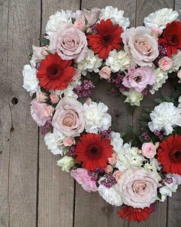 blush ivory and red open heart design featuring nude roses and red germini 
