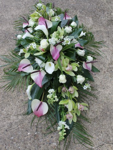 Casket Spray featuring Anthuriums, wjite Rose, Calla Lily, Orchids, Ornithaglum and Hydrangea
