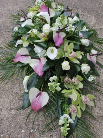 Casket Spray featuring Anthuriums, white Rose, Calla Lily, Orchids, Ornithaglum and Hydrangea