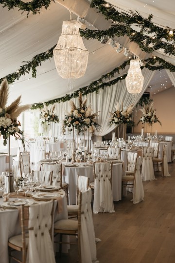 Beautiful wedding at Alrewas Hayes wedding venue - featuring toffee nude and ivory flowers - Toffee roses - Cappuccino Roses - Westminster Abbey Roses - Phalaenopsis orchids - Quicksand Roses - waxflowers - dried Ruscus - Dried Pampas grass - Eucalyptus - Bridal Bouquet