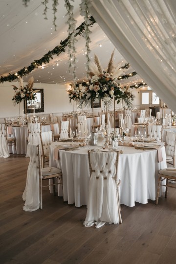 Beautiful wedding at Alrewas Hayes wedding venue - featuring toffee nude and ivory flowers - Toffee roses - Cappuccino Roses - Westminster Abbey Roses - Phalaenopsis orchids - Quicksand Roses - waxflowers - dried Ruscus - Dried Pampas grass - Eucalyptus - Bridal Bouquet