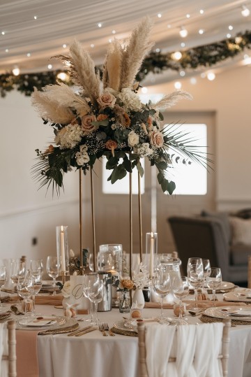 Beautiful wedding at Alrewas Hayes wedding venue - featuring toffee nude and ivory flowers - Toffee roses - Cappuccino Roses - Westminster Abbey Roses - Phalaenopsis orchids - Quicksand Roses - waxflowers - dried Ruscus - Dried Pampas grass - Eucalyptus - Bridal Bouquet