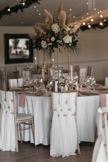 Beautiful wedding at Alrewas Hayes wedding venue - featuring toffee nude and ivory flowers - Toffee roses - Cappuccino Roses - Westminster Abbey Roses - Phalaenopsis orchids - Quicksand Roses - waxflowers - dried Ruscus - Dried Pampas grass - Eucalyptus - Bridal Bouquet