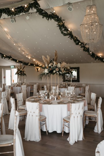 Beautiful wedding at Alrewas Hayes wedding venue - featuring toffee nude and ivory flowers - Toffee roses - Cappuccino Roses - Westminster Abbey Roses - Phalaenopsis orchids - Quicksand Roses - waxflowers - dried Ruscus - Dried Pampas grass - Eucalyptus - Bridal Bouquet