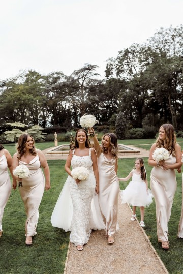 bridal and bridesmaids bouquet of ivory and white flowers featuring peony, hydrangea, avalanche roses 