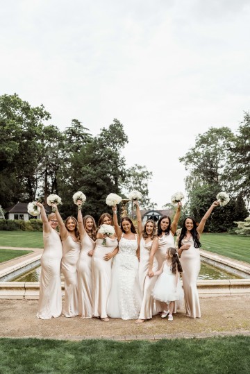 bridal and bridesmaids bouquet of ivory and white flowers featuring peony, hydrangea, avalanche roses 