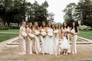 bridal and bridesmaids bouquet of ivory and white flowers featuring peony, hydrangea, avalanche roses 