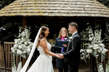 Altar flowers - ivory and white floral displays featuring Hydrangea, Avalanche Rose, Anthuriums, Peony and Gypsophila - at Moxhull Hall wedding Venue