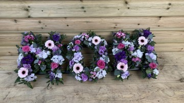 loose design mom with pink purple and lilac flowers 