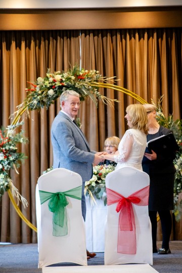 christmas wedding in solihull - festive wedding flowers - ivory and ruby wedding flowers - bridal bouquet - gypsophilla bridesmaids bouquets- moongate flowers - ceremony flowers - registrar table flowers
