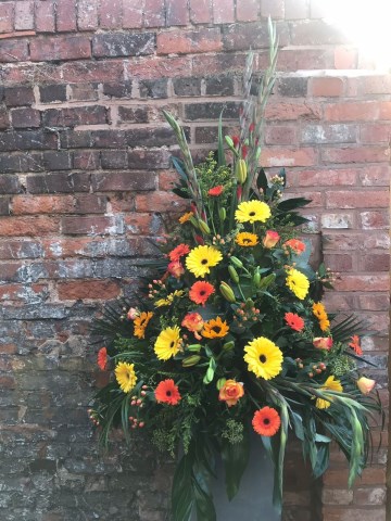 Pedestal Display In Orange And Yellow 