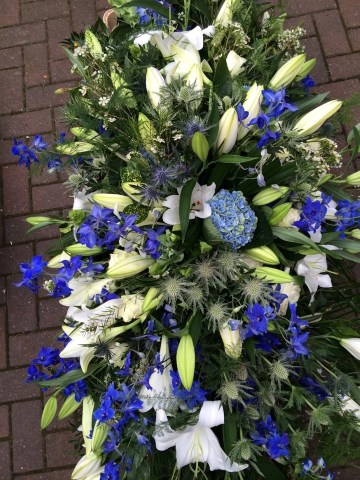 Delphinium blue and white casket spray - Delphinium- Hydrangea - Ivory Lily 