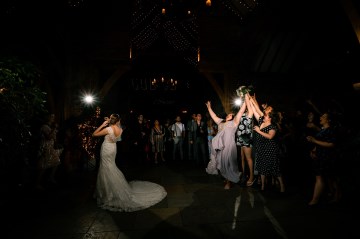 Throwing The Bouquet - Shustoke Farm Barns Wedding 