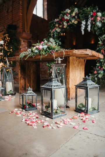 Registrar Table styling - silver lanterns - moongate- floral design - petals - styling at shustoke farm barns 