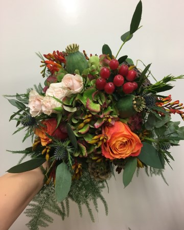bridesmaid bouquet - autumnal flowers - red hypericum - hydrangea - lotus heads - poppy heads - fern - nude spray rose - burnt orange rose 